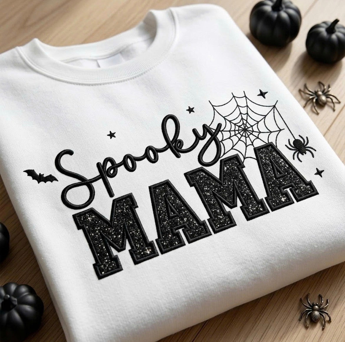 SPOOKY MAMA SPIDER WEB
Embroidered Sweatshirt