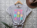 et Them T-Shirt – Empowerment Graphic Tee with Colorful Bows